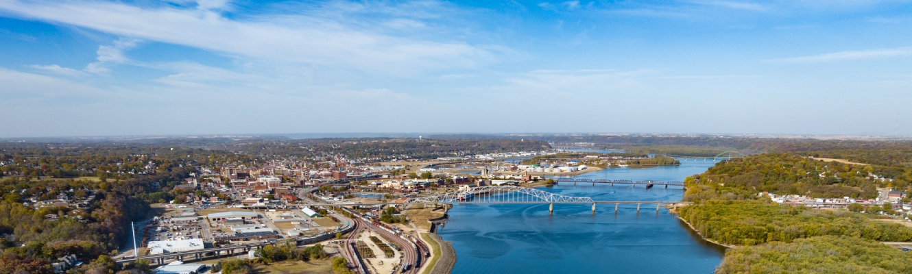 Overview look at the city of Dubuque also showing the Mississippi river and the Wisconsin and East Dubuque bridges.